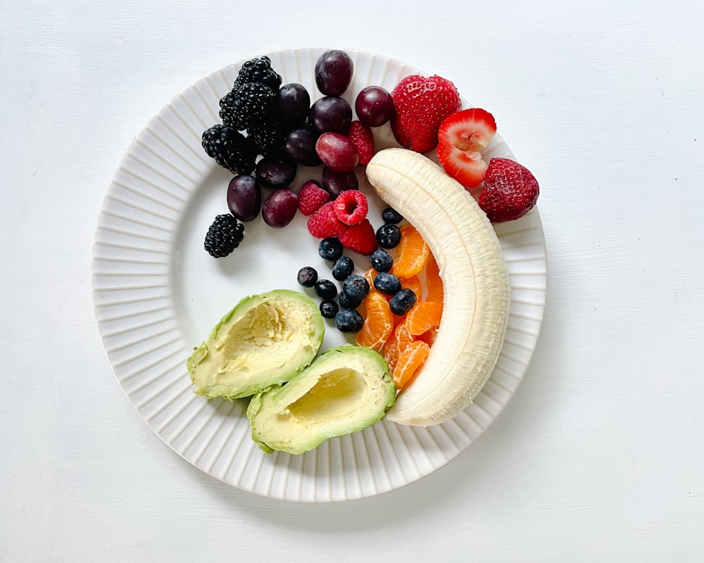 Woman enjoying healthy balanced meal with colorful vegetables and grains
