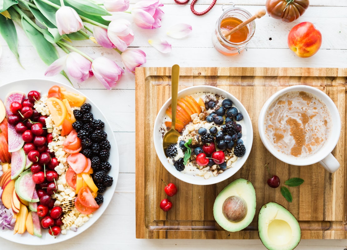 Nutritionist preparing healthy meal plan with fresh organic ingredients